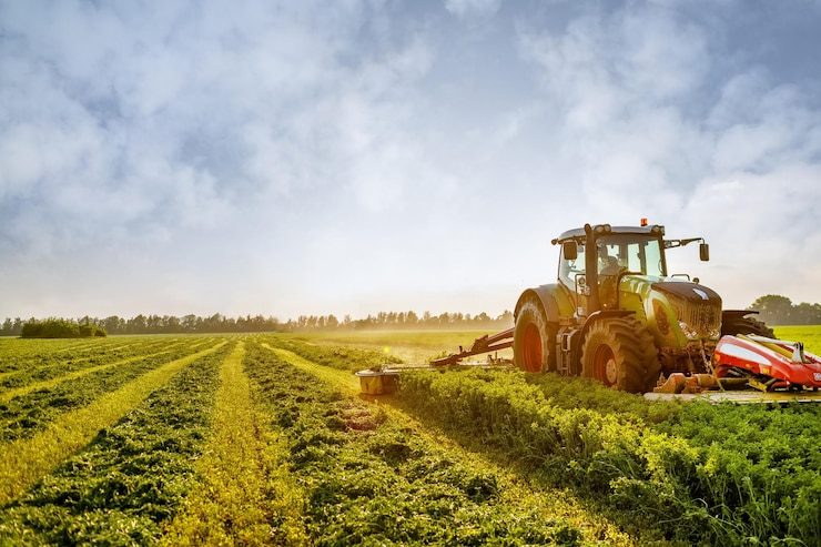 202601tractor-makes-harvesting-hay-animals-farm_627378-1301