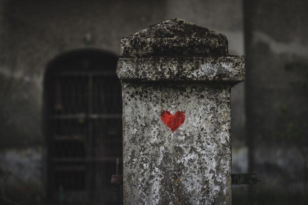 202601red-heart-painted-gravestone-cemetery_181624-56010
